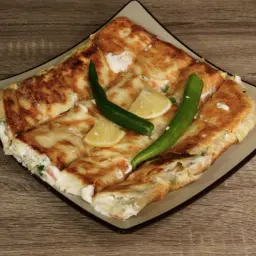 Sweet Muttabaq With Cream And Honey